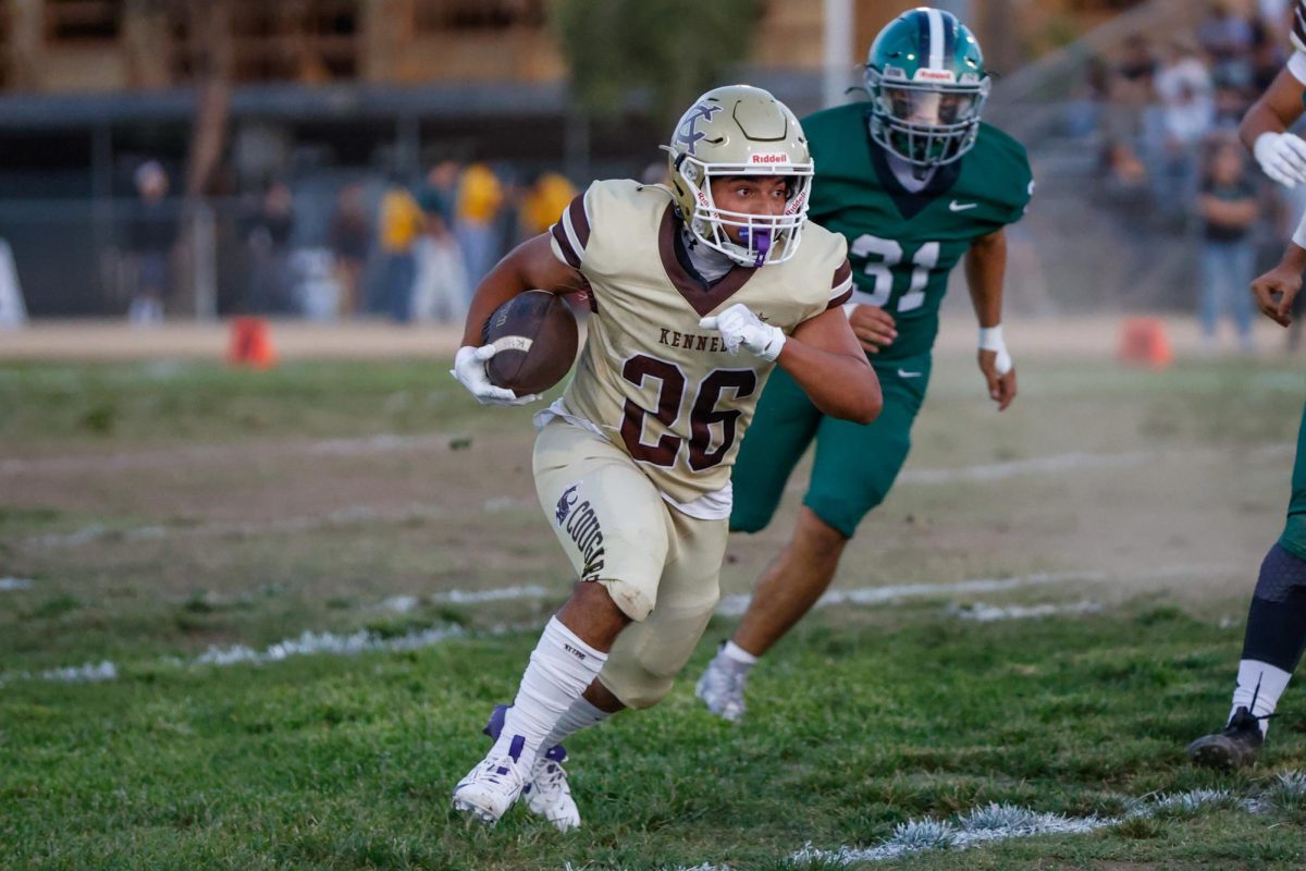 Running back Josue Sandoval charging up the field