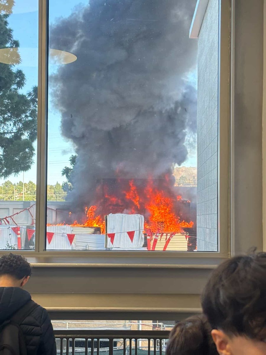 Fire erupting right outside of a classroom